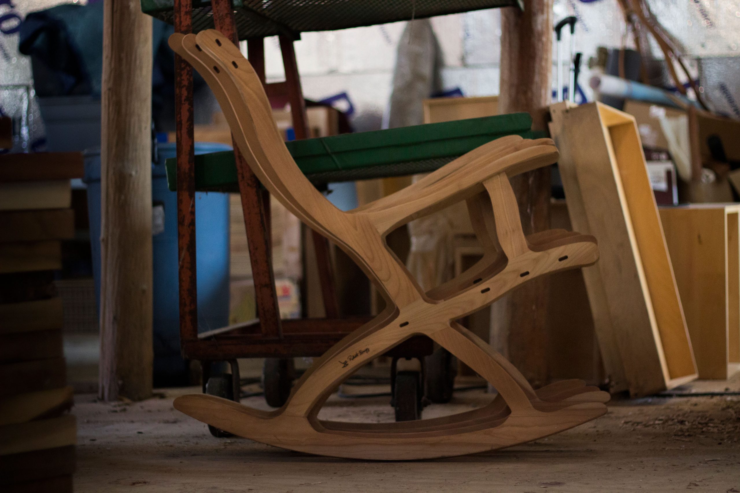 Ergonomic rocking chair frame with wood burned signature